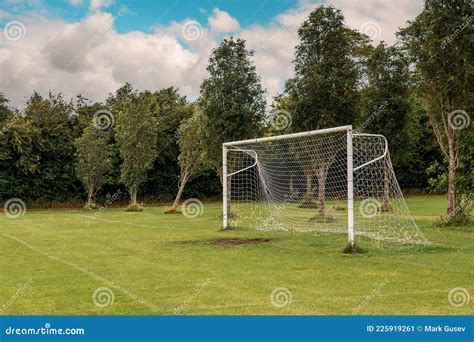 White Soccer Of Football Goal Post On A Grass Field Of A Training