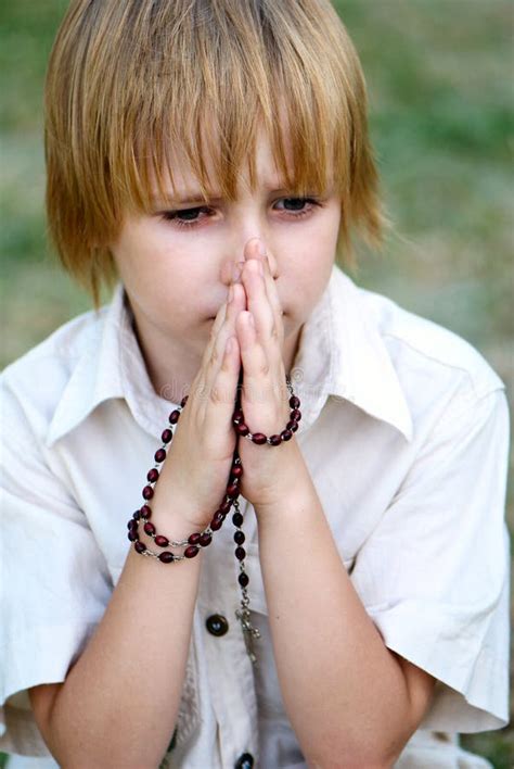 4 Young Boy Praying Outdoors Free Stock Photos Stockfreeimages