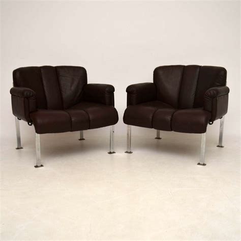 Pair Of Retro Leather And Chrome Armchairs By Girsberger Vintage 1960s