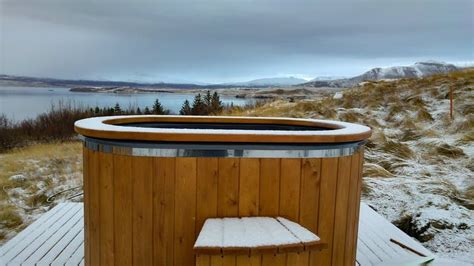 Glass Lodge On Icelandic Fjord Offers Stunning Views Of The Northern Lights