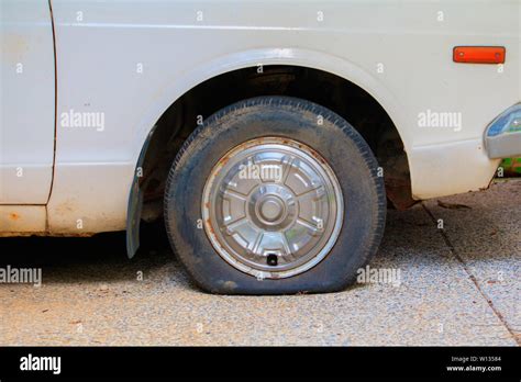 Wheel Flat Tire Of The Car Old With Copy Space Add Text Stock Photo Alamy