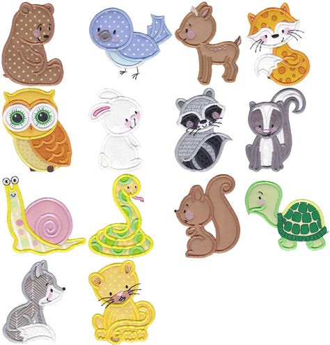 An Assortment Of Animal Shaped Magnets On A White Background