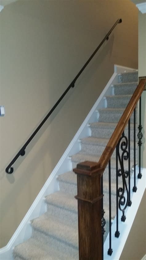 Install your posts at the top and bottom of your stairs. Wall Handrails - Stair Solution