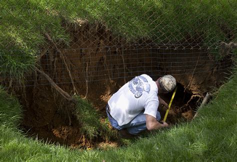 How To Fix A Sinkhole In Your Yard Reverasite