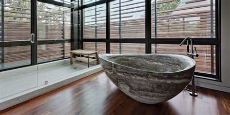 20 Bathroom Designs With Stunning Stone Tubs
