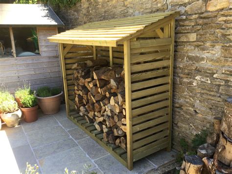 Roofed Log Store Outdoor Log Storage Jacksons Fencing