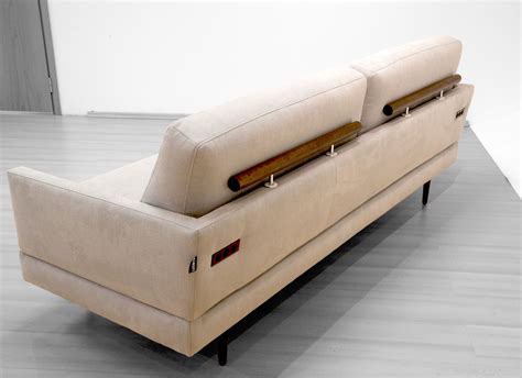 tall legs make the tango sleeper sofa stand out simply lift one of the