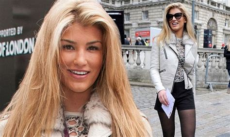 amy willerton wears tiny black shorts and tights as she attends mands show at london fashion week