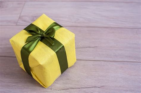 Bright Yellow Box On Wooden Background Stock Photo Image Of
