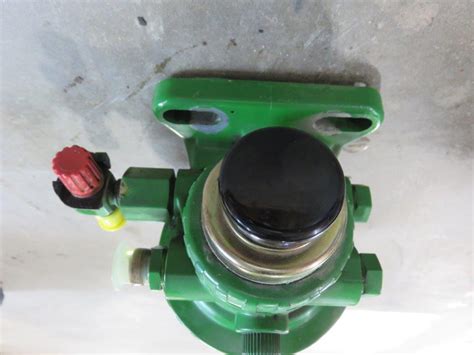 John Deere Fuel Filter Base And Hand Primer Pump Assembly Re67225 Filters