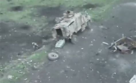 Russian Soldier Surrenders To Ukrainian Drone Before Being Led Across