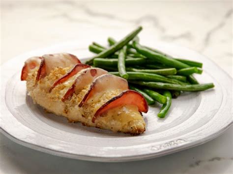 Stir in tomatoes, sugar, and salt and pepper to taste. Hasselback Chicken Cordon Bleu Recipe | Ree Drummond ...