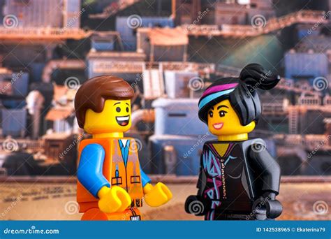 Lego Hard Hat Emmet And Lucy Minifigures Looking At Each Other And