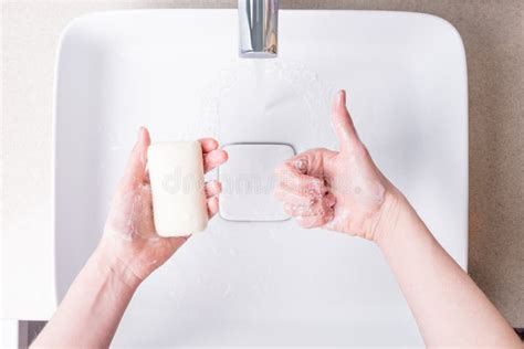Washing Hands With Soap In The Bathroom Stock Photo Image Of Pour