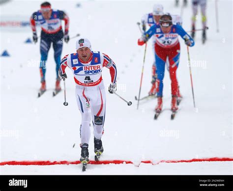 Norways Petter Northug Crosses The Finish Line To Win The Mens 50 Km