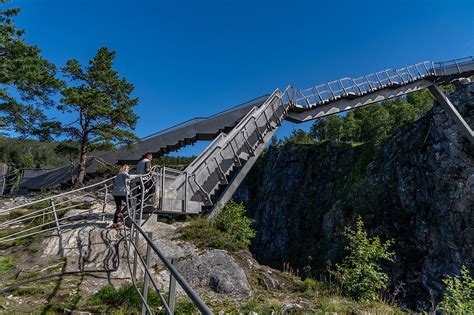 Step Bridge Spans Gorge Above Norways Voringsfossen Waterfall