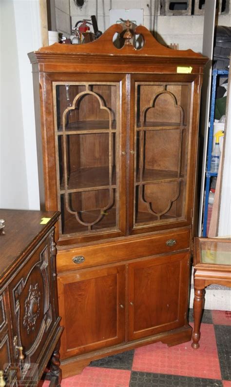 There are many times that i want to hang on to something for awhile. VINTAGE WOODEN CORNER CURIO CABINET WITH 2 DOORS