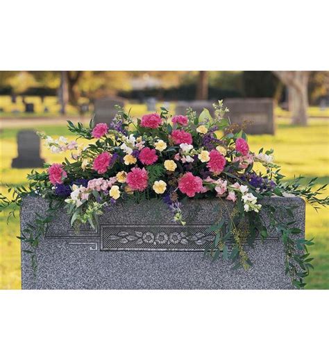 Send the freshest flowers sourced directly from farms. Monument Memorial Flowers - TF222-3 ($109.76)