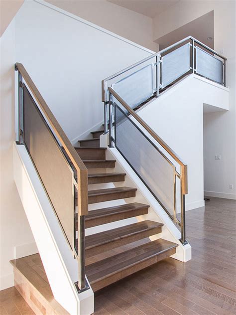 As well as protecting your base material, a stair runner will reduce noise; Modern Home Guardrails for Main Interior Stairs - Seattle, WA - Blackbird Iron & Design