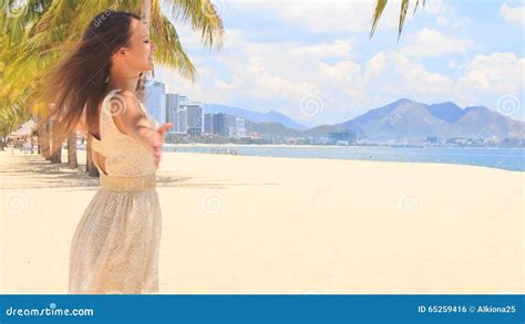 Slim Girl In White Frock Swings With Hands Aside On Beach Stock Footage Video Of Short