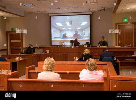 Video Arraignment In Criminal Court In Boise Idaho Defendants Appear On Video Screen From Secure