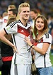 Montana Yorke and German forward Andre Schuerrle kissing