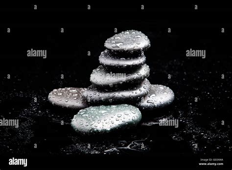 Spa Stones Black Shiny Zen Stones With Water Drop Stock Photo Alamy