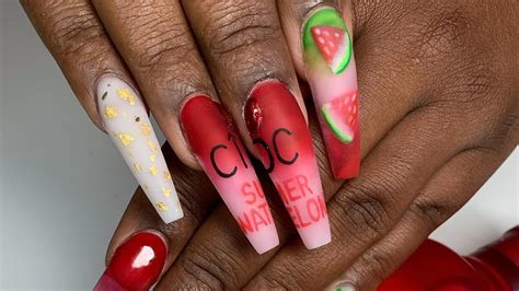 9 Reasons To Get Into Logo Nails This Spring - Essence