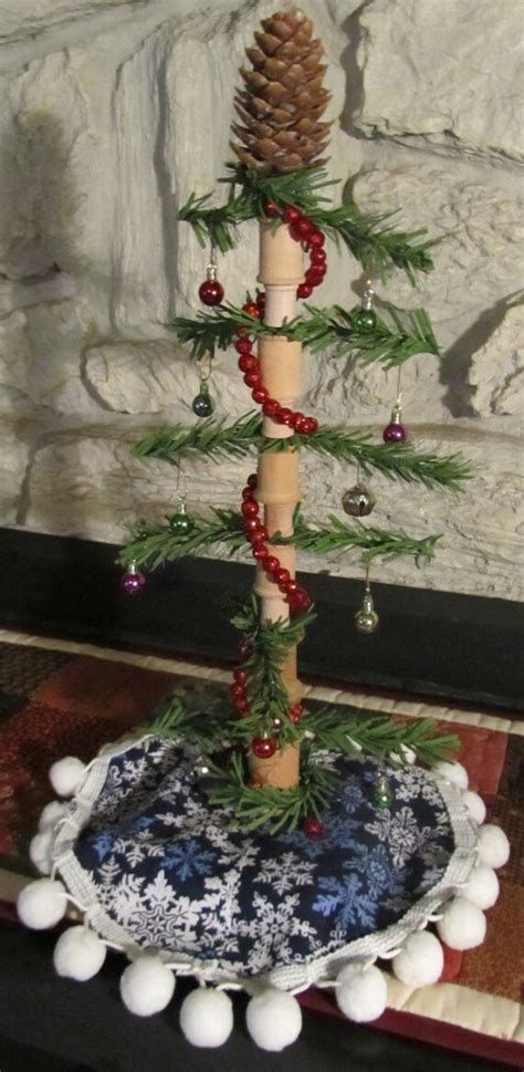 Small Decorative Christmas Tree Made From Vintage Thread Spools And Garland