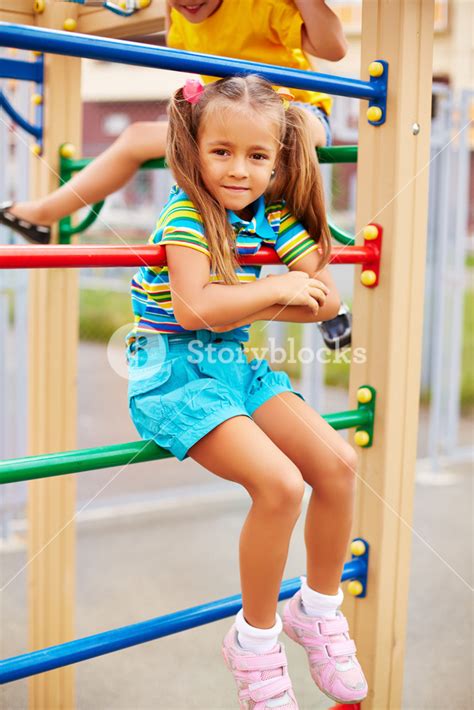 Joyful Child Smiling At Camera On Playground Royalty Free Stock Image