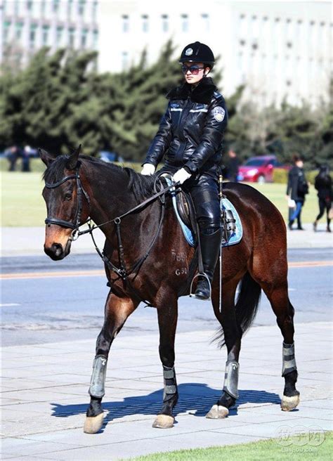 Dalians Mounted Policewoman In Full Leather Uniform