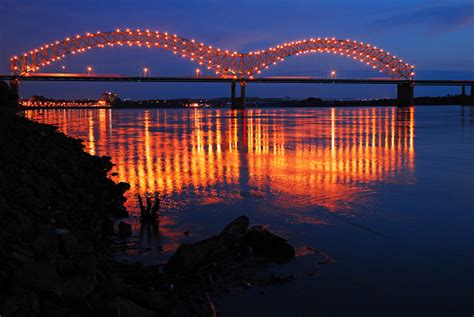 Lights Of The De Soto Bridge In Memphis Reflect In The Mississippi