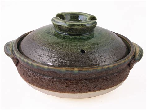 The most common japanese clay pot material is ceramic. Large Rustic Jade Green and Brown Japanese Donabe Clay Pot