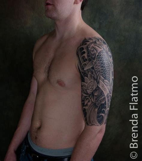 black and grey sleeve tattoos koi and lotus half sleeve healed brenda flatmo tattoo and art