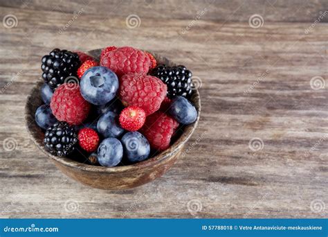 Assorted Berries In Bowl On Wood Stock Photo Image Of Blueberry
