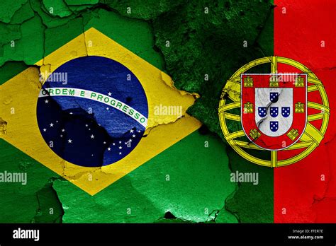 Flags Of Brazil And Portugal Painted On Cracked Wall Stock Photo Alamy