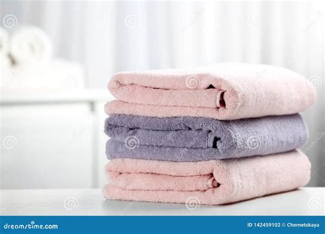 Stack Of Fresh Towels On Table Stock Photo Image Of Body Fresh