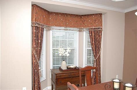 Maybe you would like to learn more about one of these? How to choose curtains for bay windows
