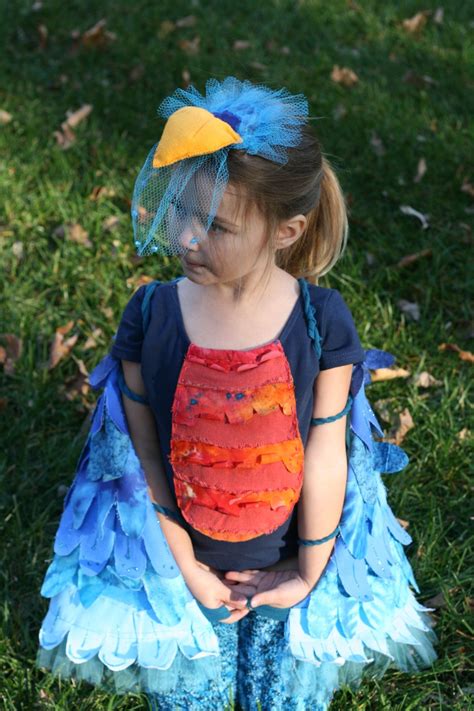 For this easy parrot costume, i took some inspiration from the adorable flamingo costume ashley made last year. Blue bird | Bird costume kids, Parrot costume, Bird costume