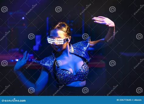 dancersshowing techno dance performance in disco and nightclub stock image image of light