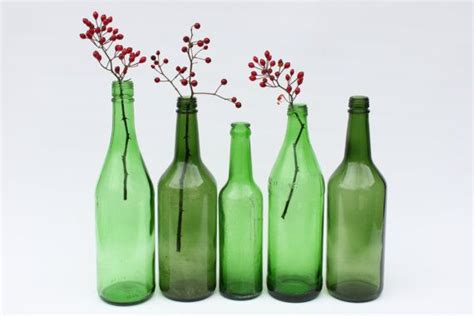 vintage green glass bottles set of 5 etsy green glass bottles vintage green glass glass