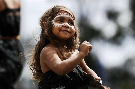 a beautiful australian aboriginal girl 3 years old and proudly performing in the gindan djalbu