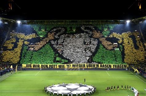 A spellbinding sight in the south stand of borussia dortmund's signal iduna park that may not be quite visible from space, but whose dimensions and noise reach up to the stars. 'Europe Wants To Stand' - Borussia Dortmund's Yellow Wall Calls For Change Against Spurs