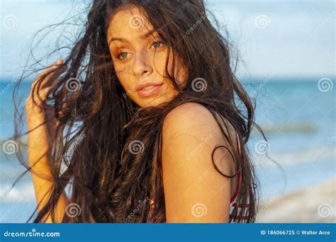 A Lovely Brunette Model Enjoys The Sunset While On Vacation In The YucatÃ¡n Peninsula Near