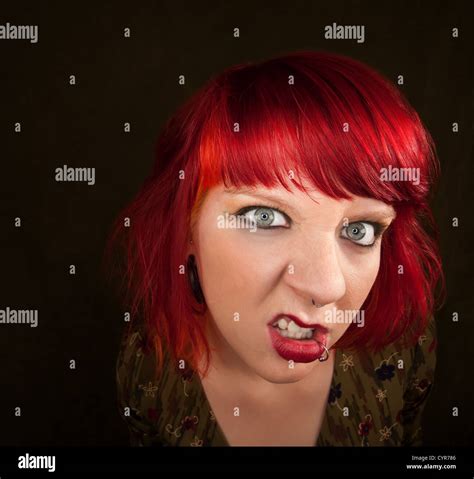 Pretty Punky Girl With Brightly Dyed Red Hair Stock Photo Alamy