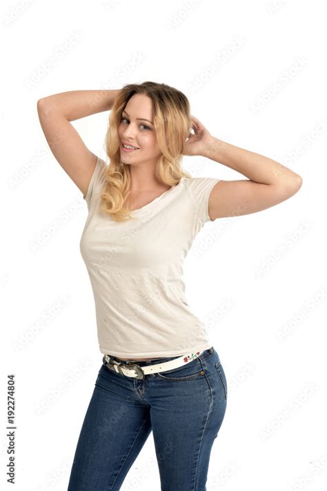 34 Portrait Of Blonde Girl Wearing White Shirt Posing With Hands