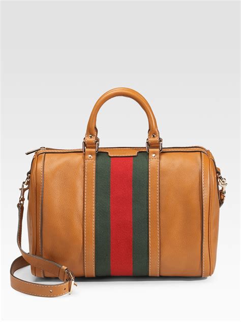 Gucci bags, all guaranteed authentic and majorly on sale. Gucci Vintage Web Medium Boston Bag in Tobacco (Brown) - Lyst
