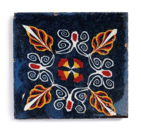 An Egyptian Mosaic Glass Inlay Plaque With Lily And Palmette Motif