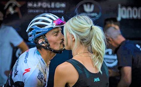 Crossing the line in his world champion's rainbow jersey alaphilippe put his thumb in his mouth in honour of his newborn son with his partner marion rousse. Marion Rousse Julian Alaphilippe Strade Bianche 2020 ...