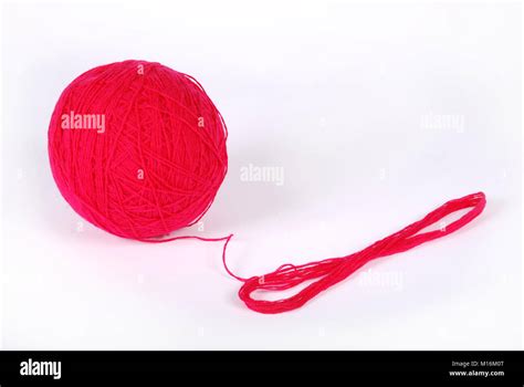 Red Threads And Clew Isolated On A White Background Stock Photo Alamy
